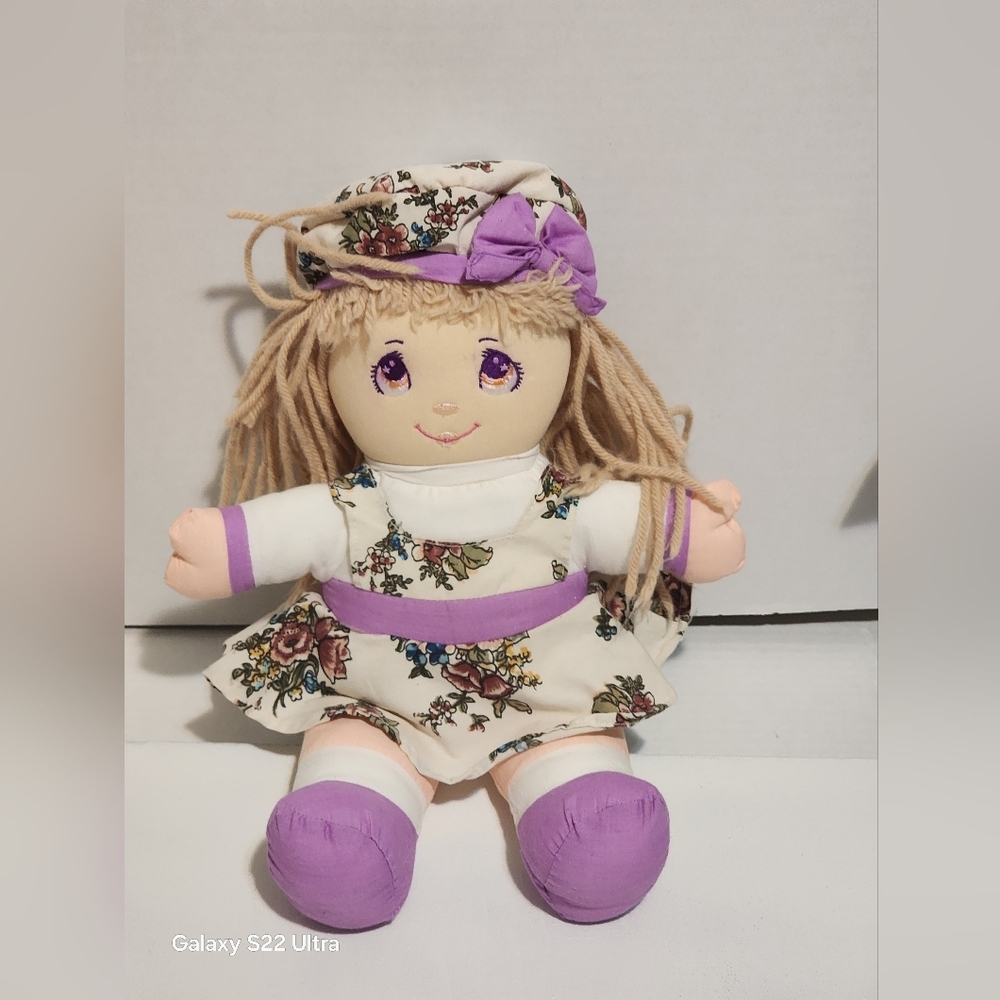 Vintaje Floral Doll with Purple Accents